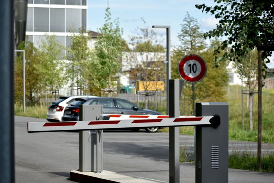 white-and-red-sedan-on-road-during-daytime.jpg white and red sedan on road during daytime